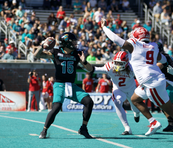 Ethan Vasko, quarterback, makes a throw.